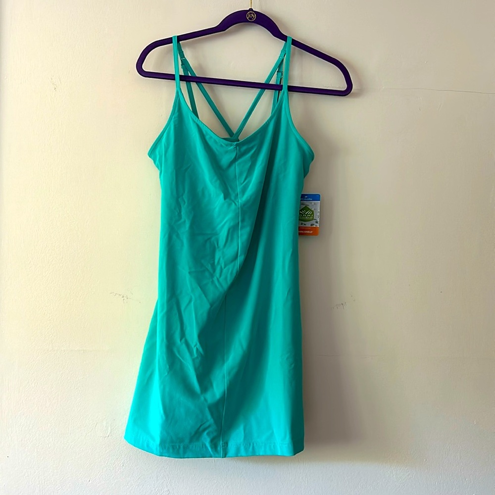 Columbia cross strap dress with attached shorts. NWT